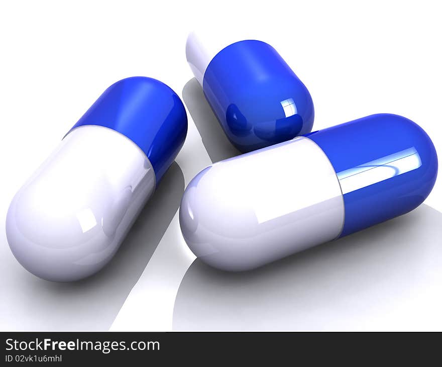 Three white/ blue pills isolated. Three white/ blue pills isolated