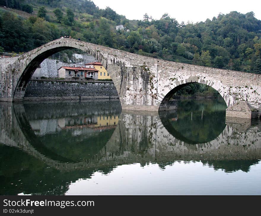 An ancient bridge in tuscany, italy. An ancient bridge in tuscany, italy