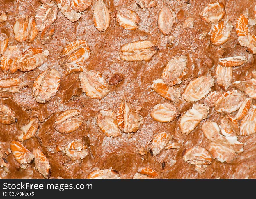 The top of a loaf of bran bread. The top of a loaf of bran bread