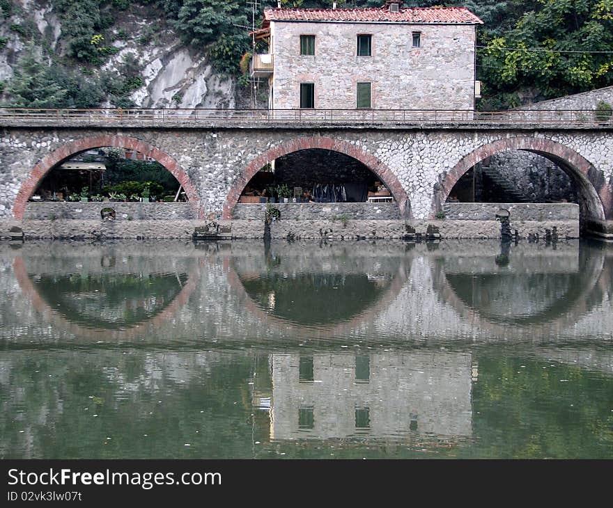 Building on the river, tuscany, italy