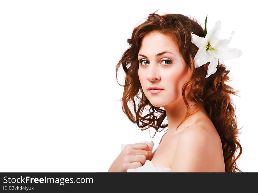 Portrait of charming young girl with a flower