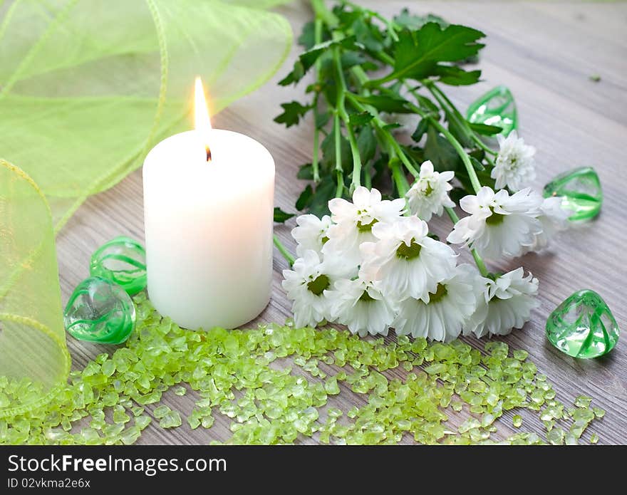 Bath salt with candle and flower