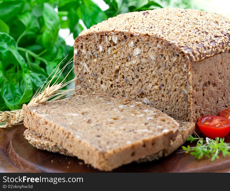 Healthy bread on wooden board closeup