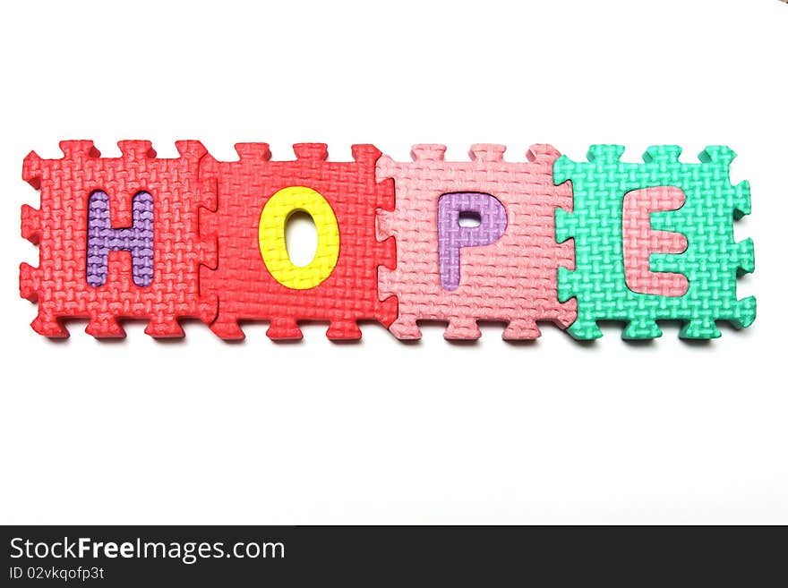 Letters puzzle from colorful plastic blocks. Letters puzzle from colorful plastic blocks