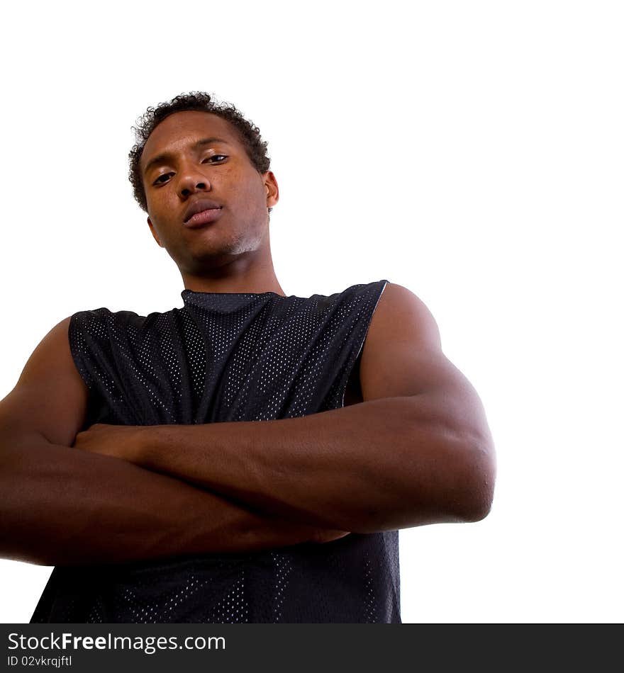 Mean looking teenager over white background. Shot from below. Mean looking teenager over white background. Shot from below.