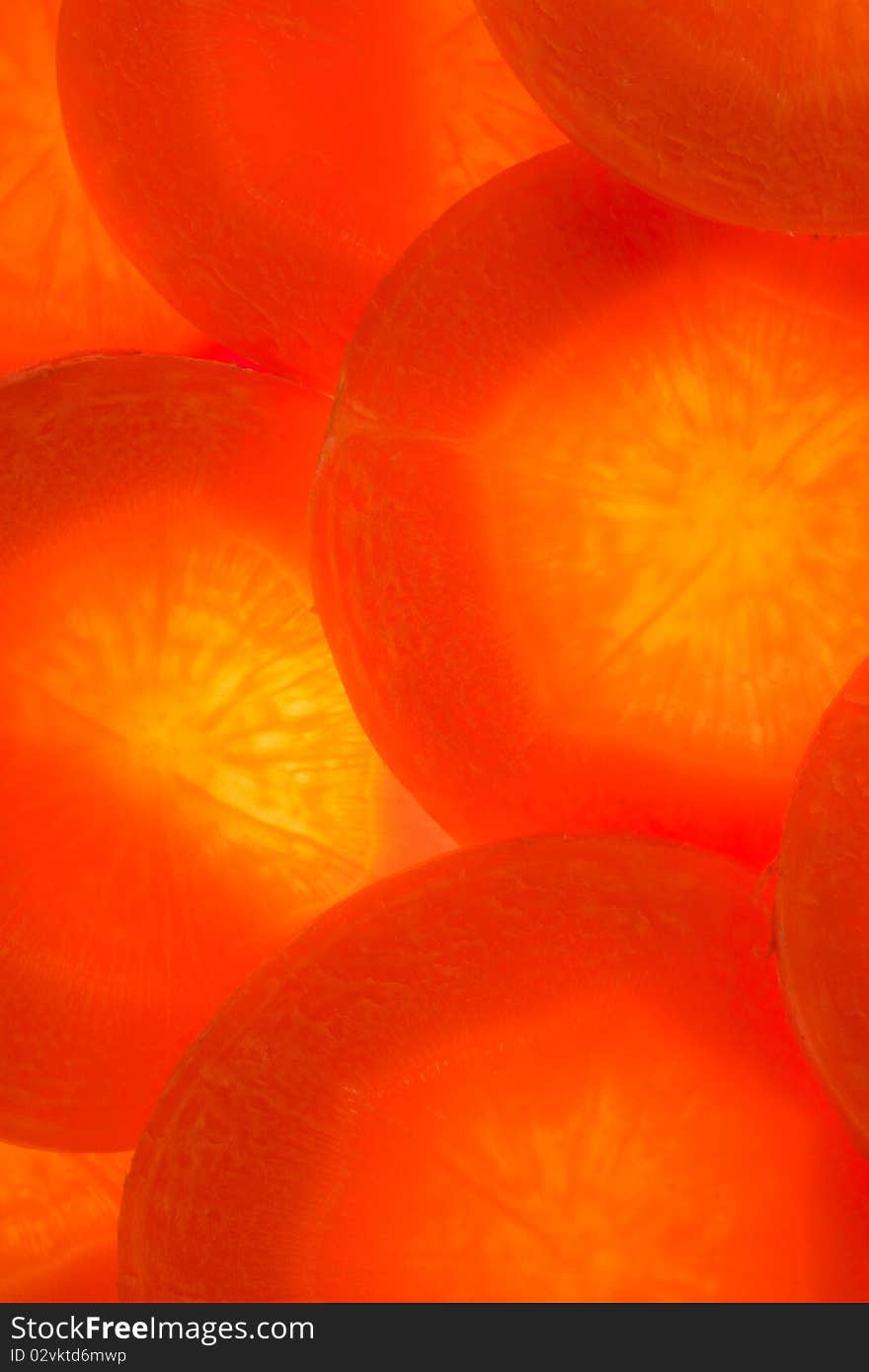 Of the circles of carrot lined background. Without gaps. Illumination from below. Of the circles of carrot lined background. Without gaps. Illumination from below.