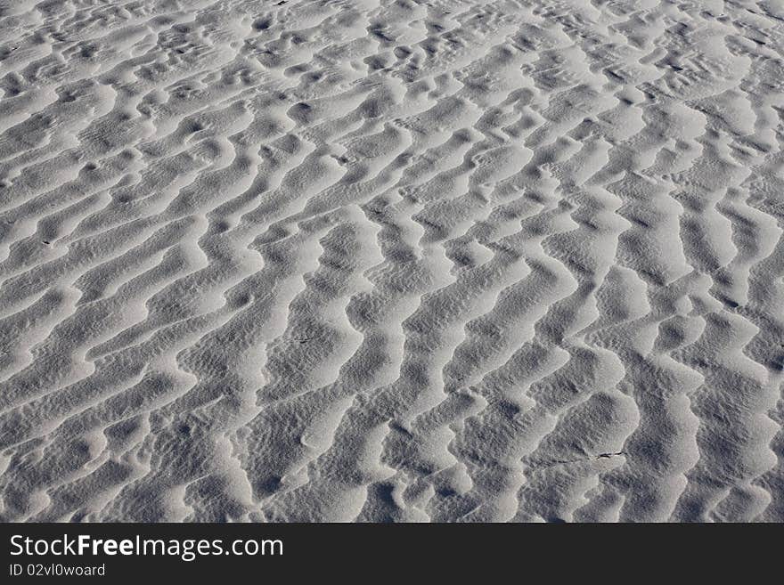 Texture of white sand dunes