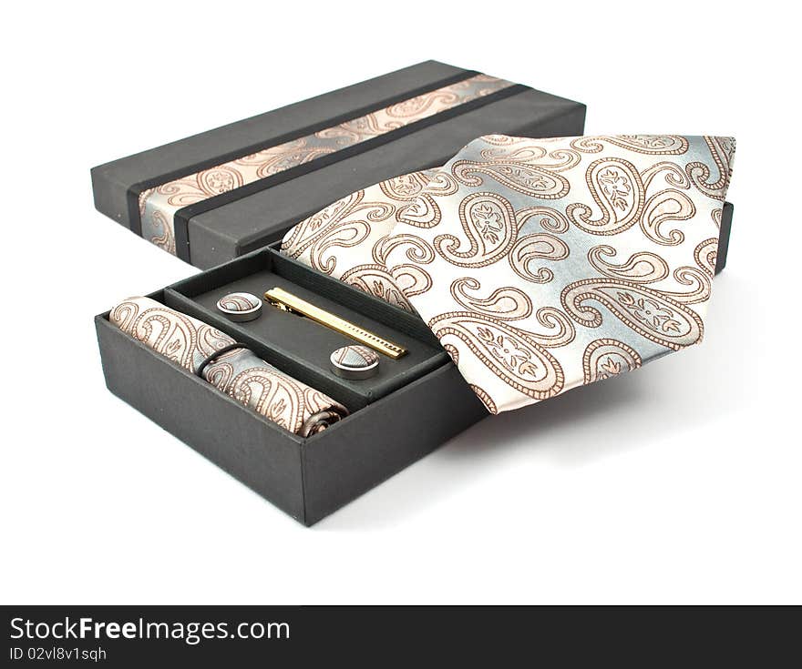 Tie with cufflinks in a box