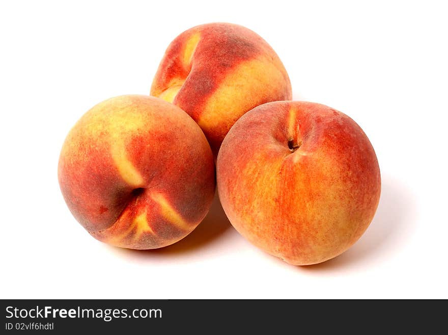 Peaches isolated on white background