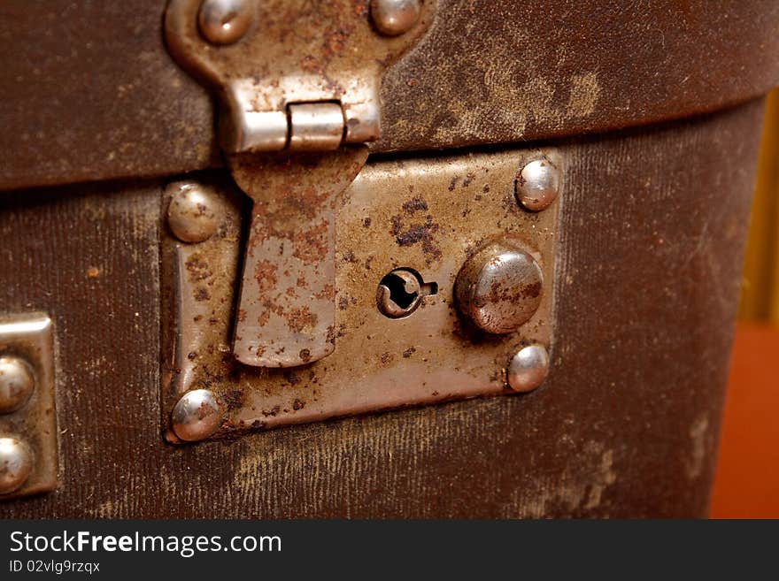 Vintage brown suitcase with open lock