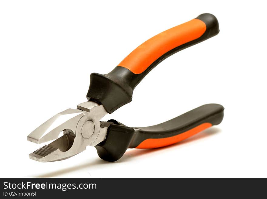 Black-orange pliers isolated over white background