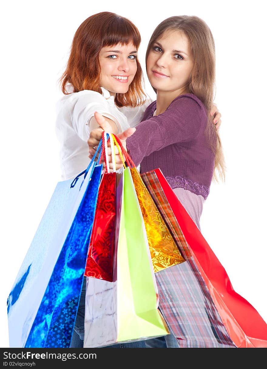 Two teen girls with bags. Isolated on white background