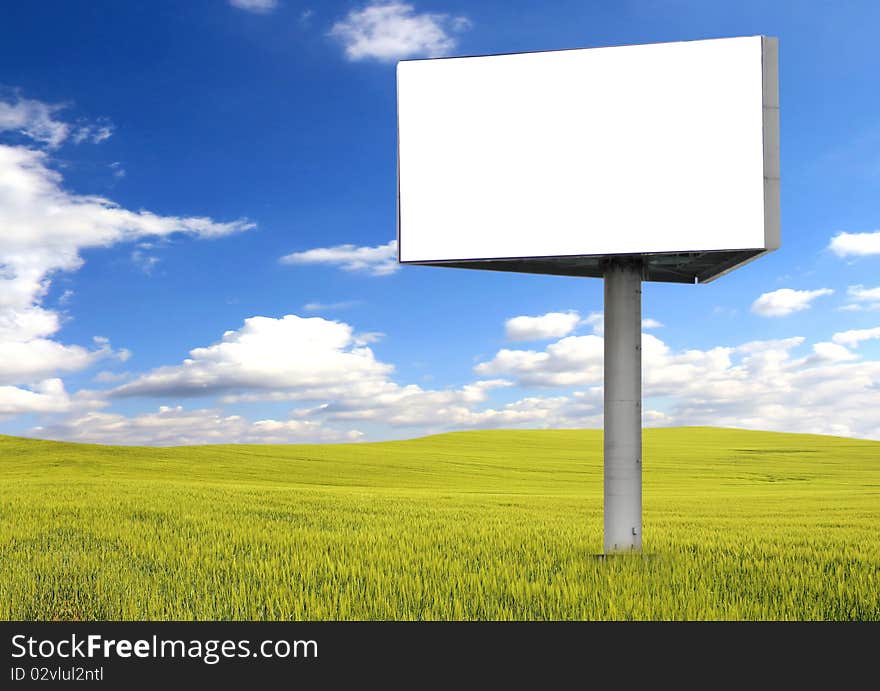 Big blank billboard in field