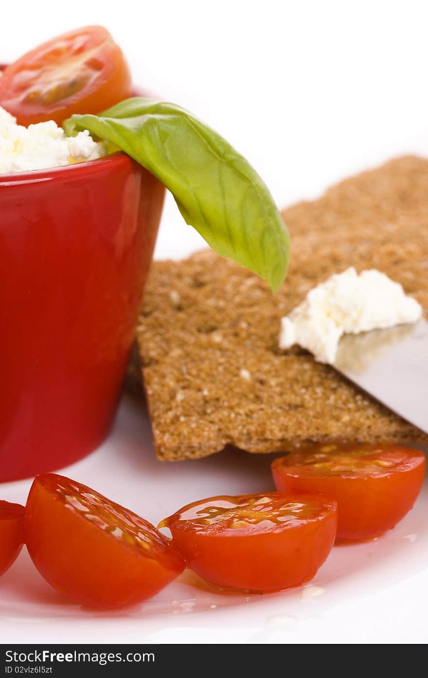 Creame cheese, tomatoes and crisps