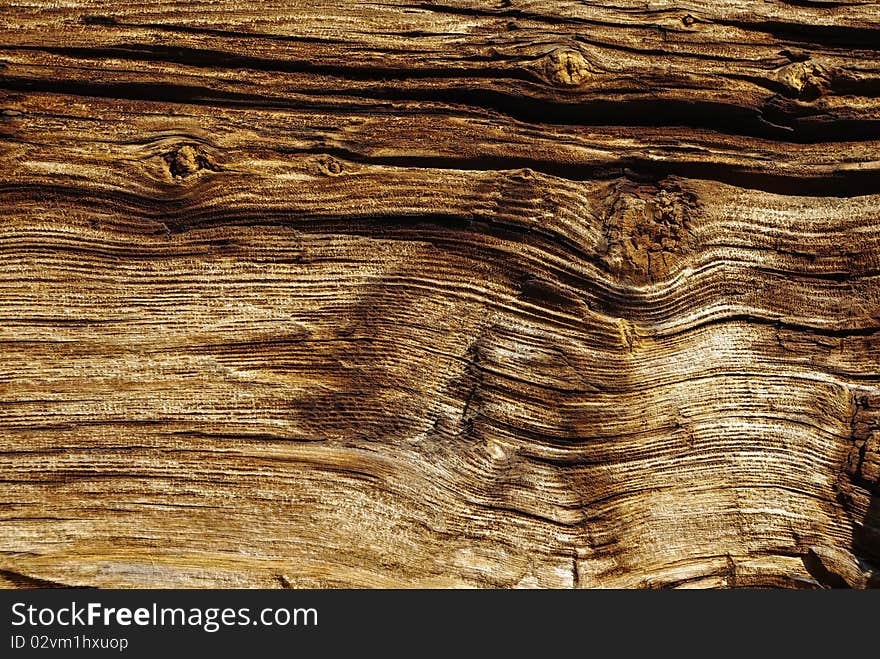 Old wooden wethered board surface as background. Old wooden wethered board surface as background