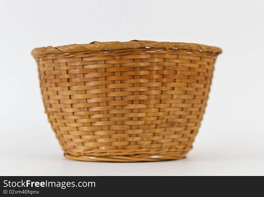 An empty basket on a white background