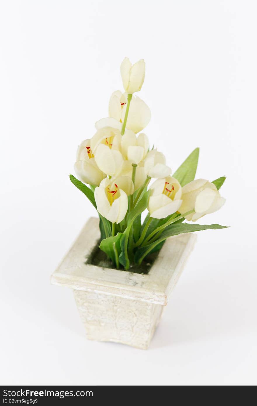 Decorative artificial flowers on a white background