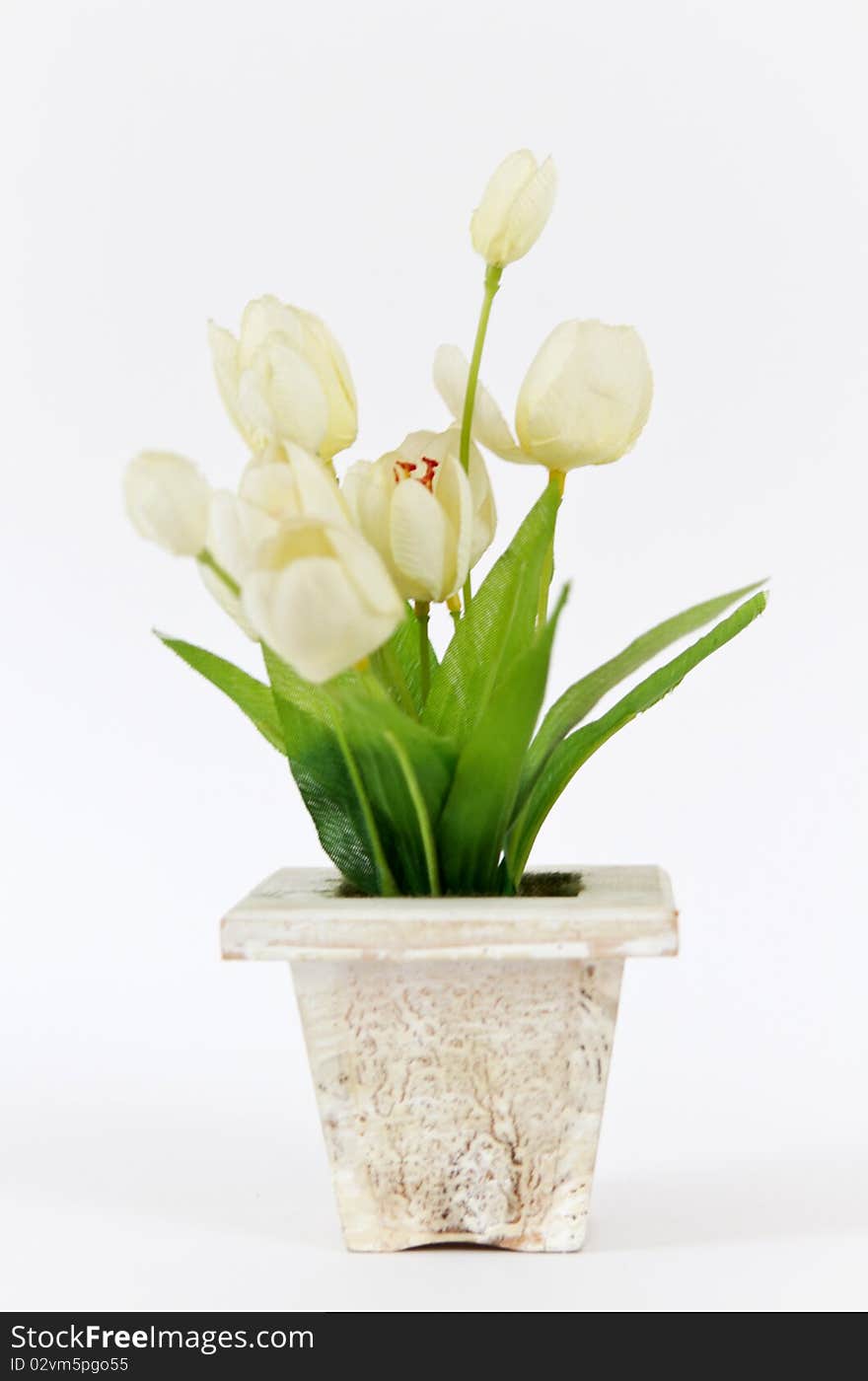 Decorative artificial flowers on a white background