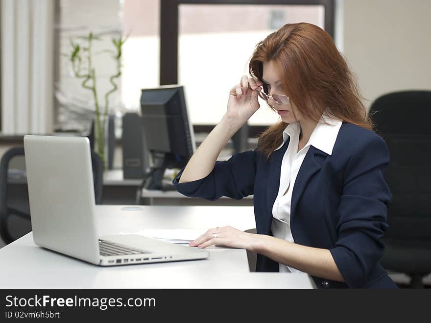 Business woman work on laptop in office