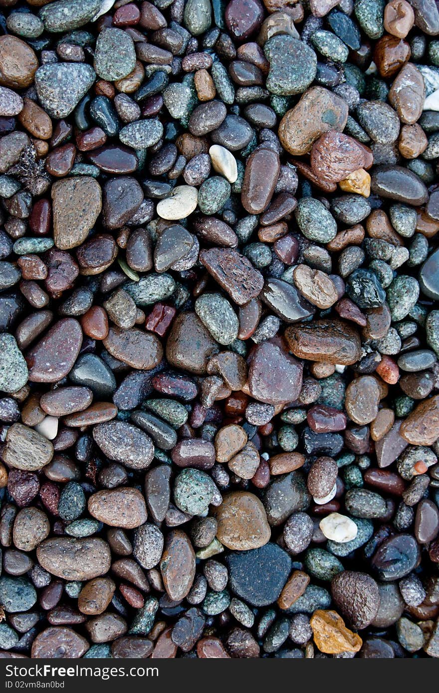 Wet clourful stones as a background