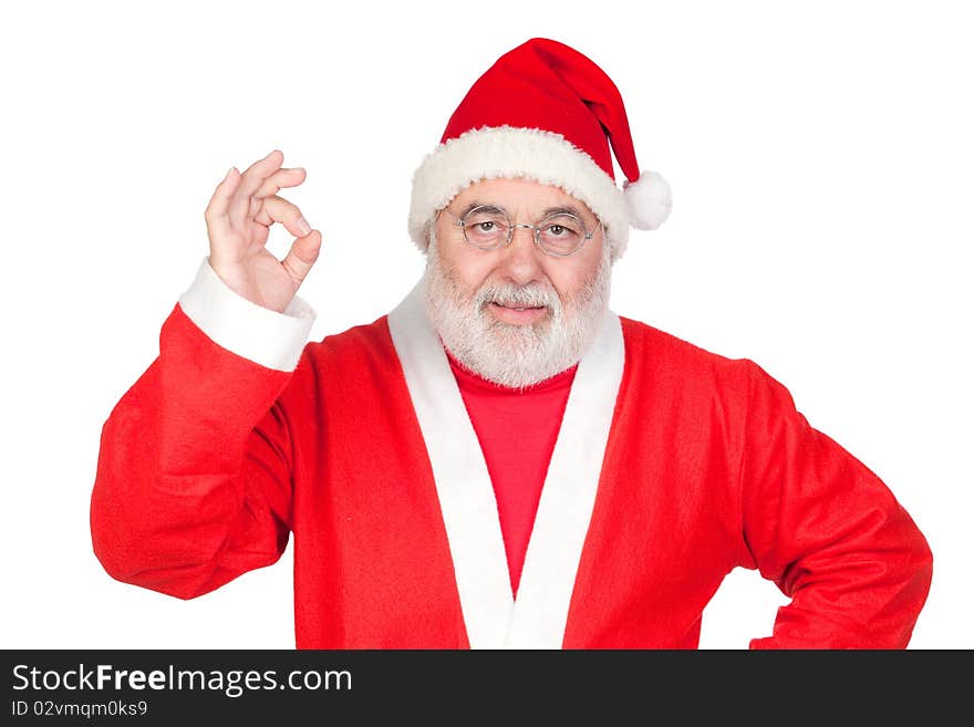 Funny Santa Claus saying OK with his thumbs isolated on white background