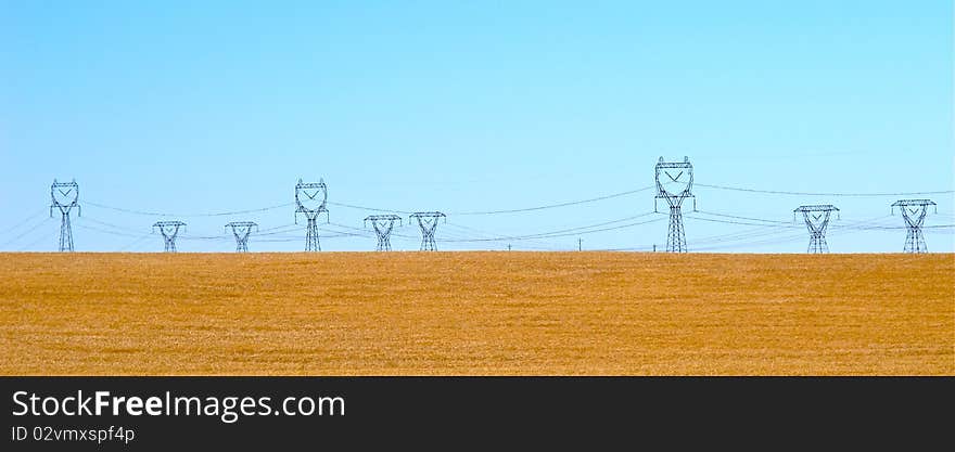 Wheat field of west united states, blue sky and iron titan. Wheat field of west united states, blue sky and iron titan