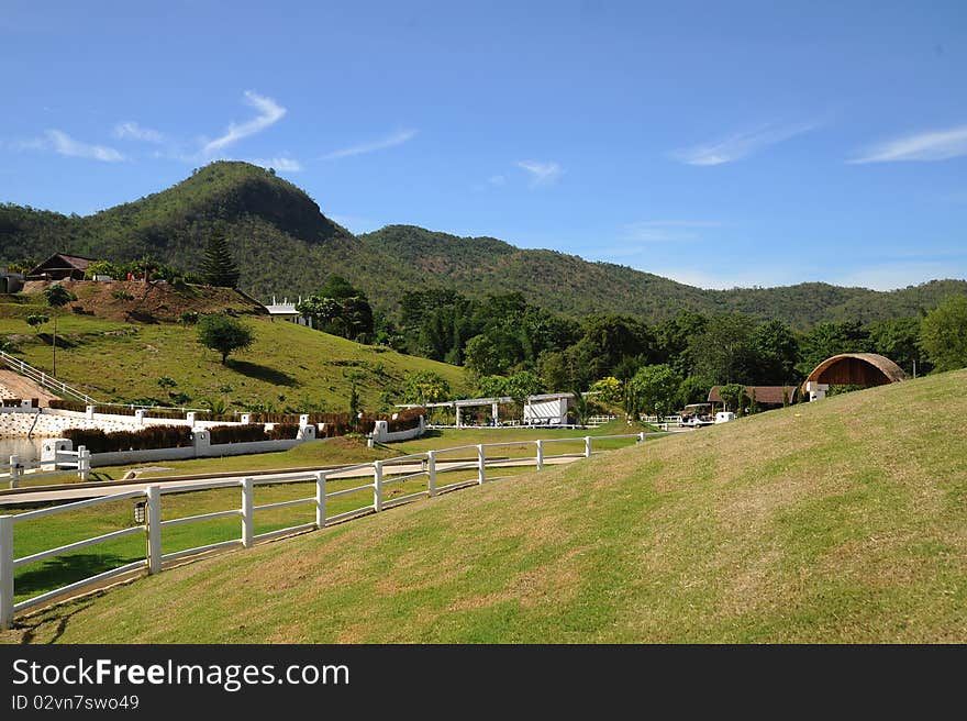 White fence in the hill