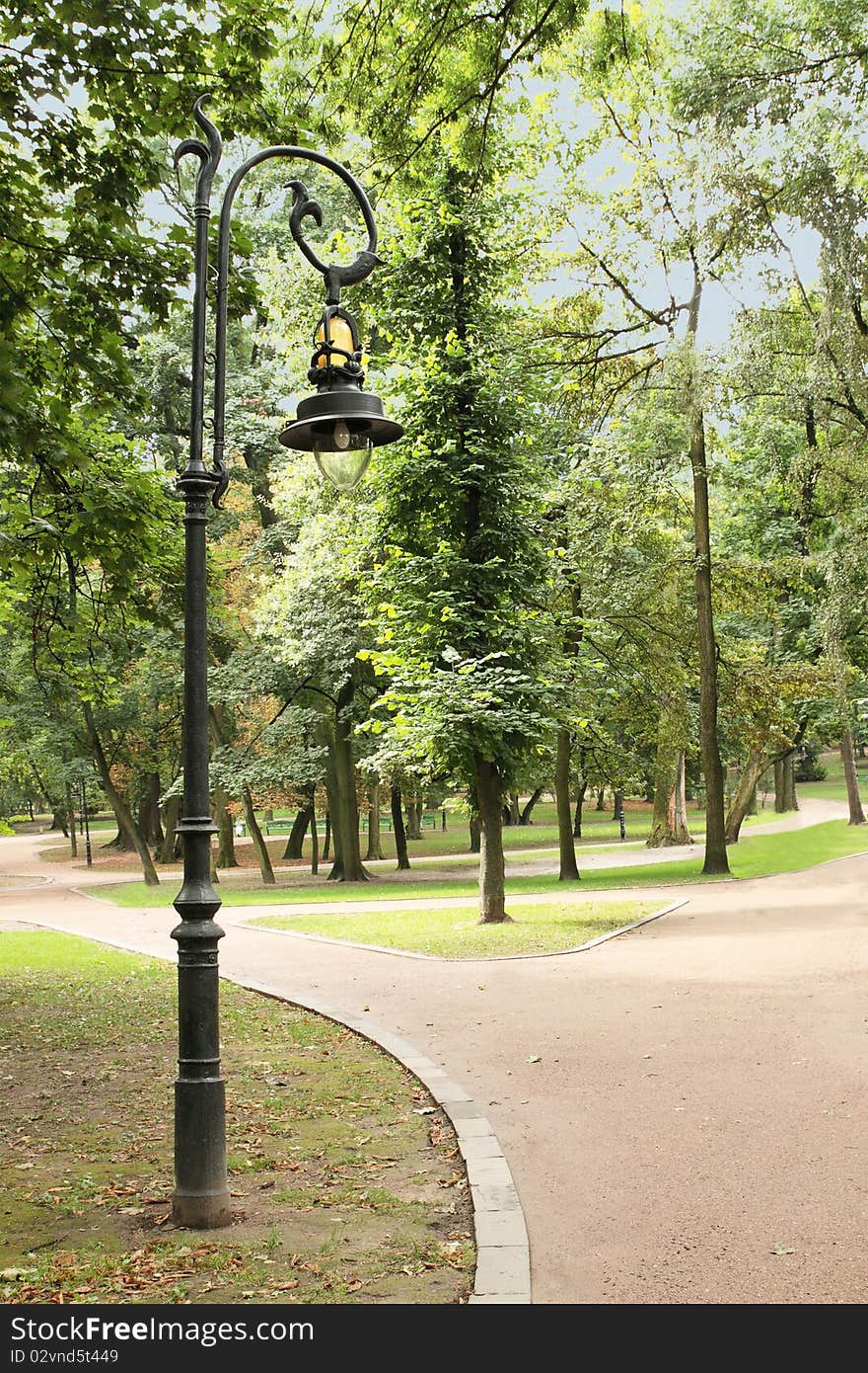 Park landscape / strolling paths and the lamp