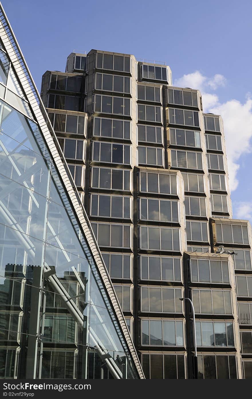 Glass windows against blue sky