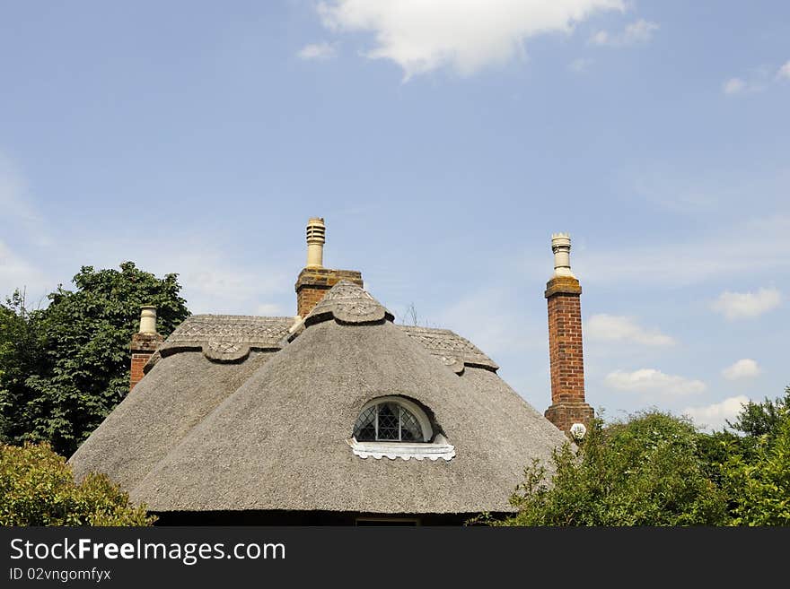 Rural house against blue sky in summer season. Rural house against blue sky in summer season