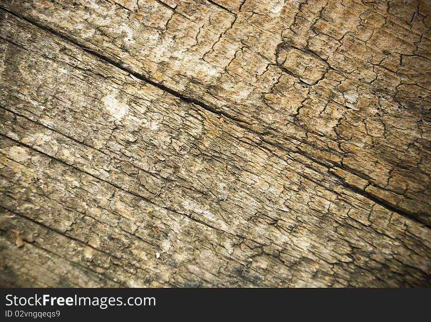 Beautiful old cracked wood surface. Beautiful old cracked wood surface