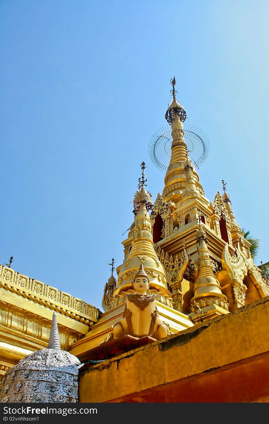 Gold pagoda in sky background in asia