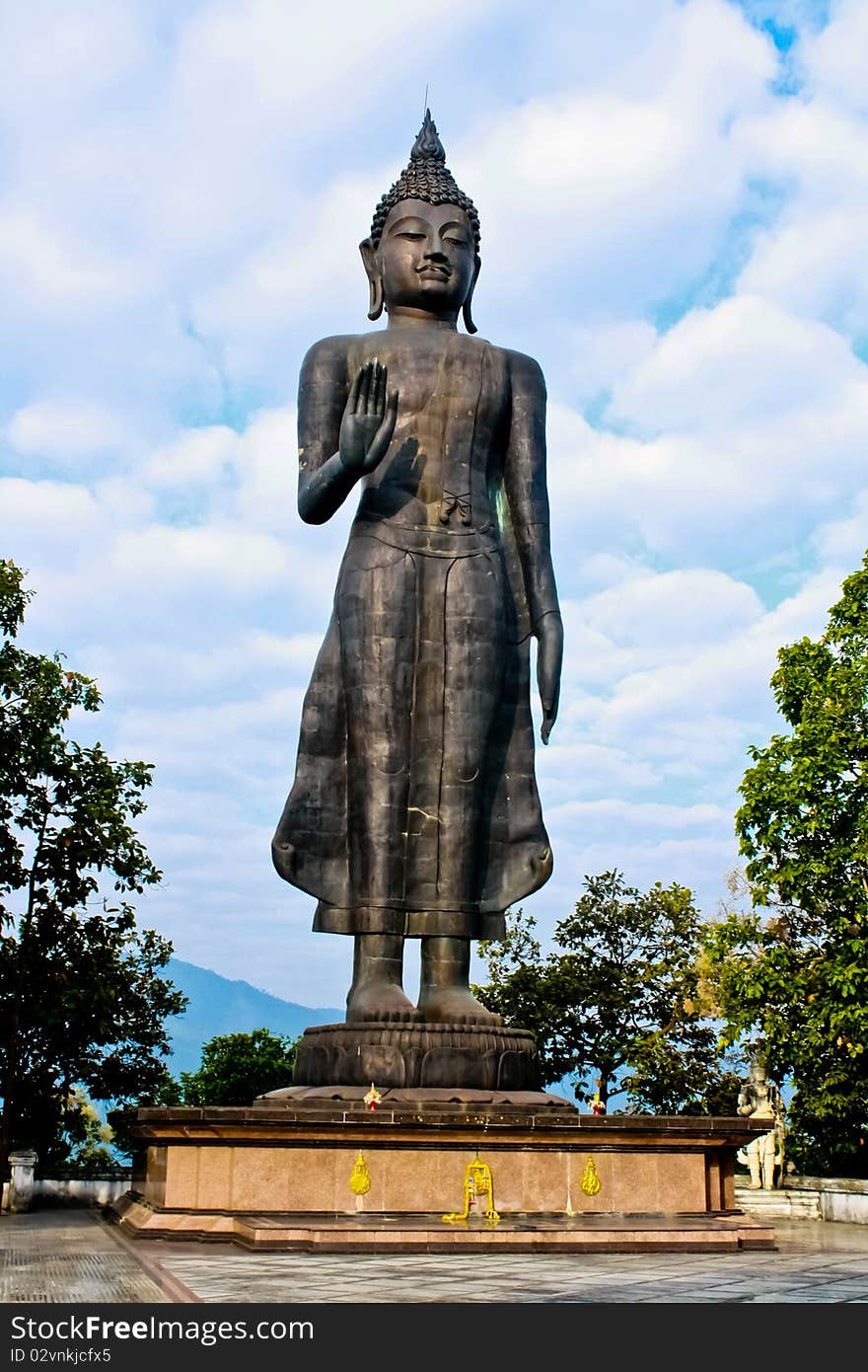 Buddha image in sky background in thailand