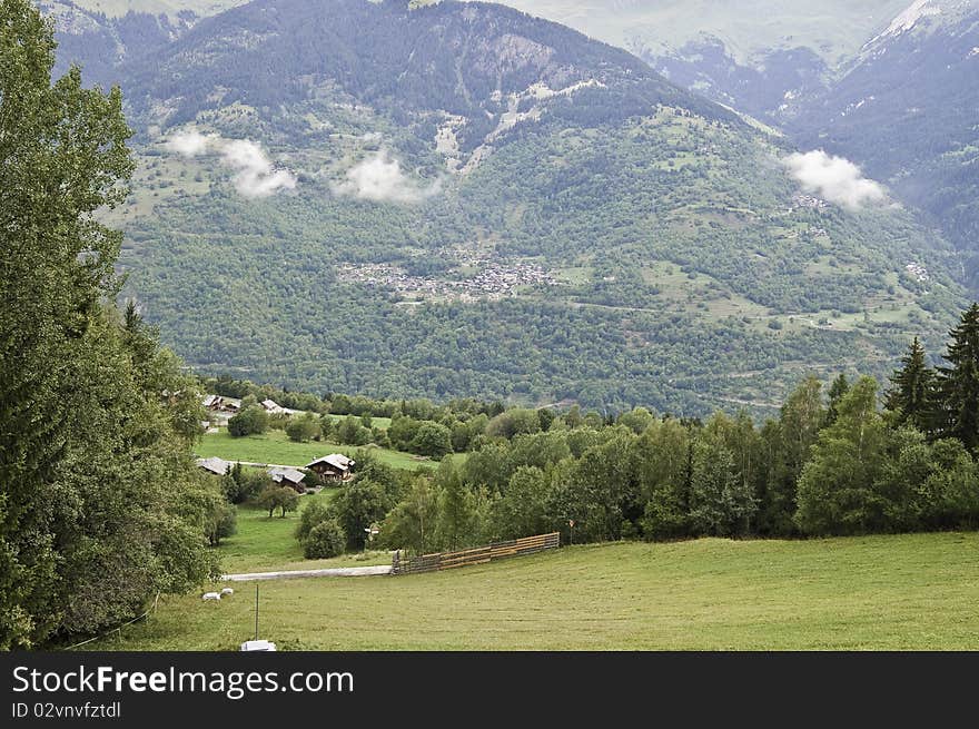 This image shows a forested landscape of La Vanoise National Park. This image shows a forested landscape of La Vanoise National Park