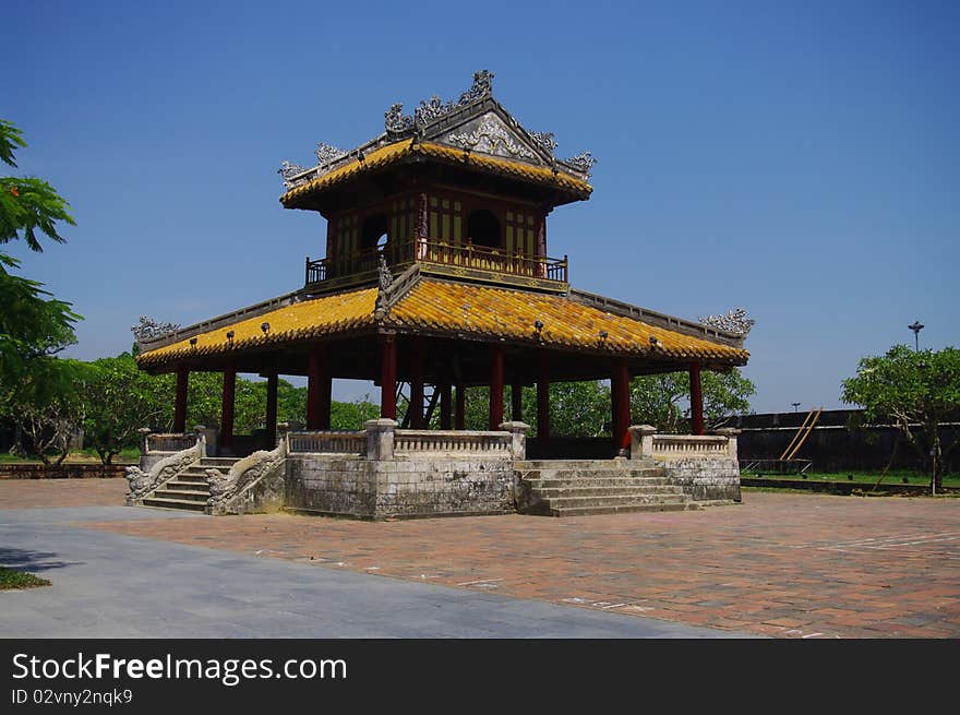 Booth with a bell on the south side of the citadel in Hue on the banks of the Perfume River. A bronze bell is still present in religious buildings. Booth with a bell on the south side of the citadel in Hue on the banks of the Perfume River. A bronze bell is still present in religious buildings.