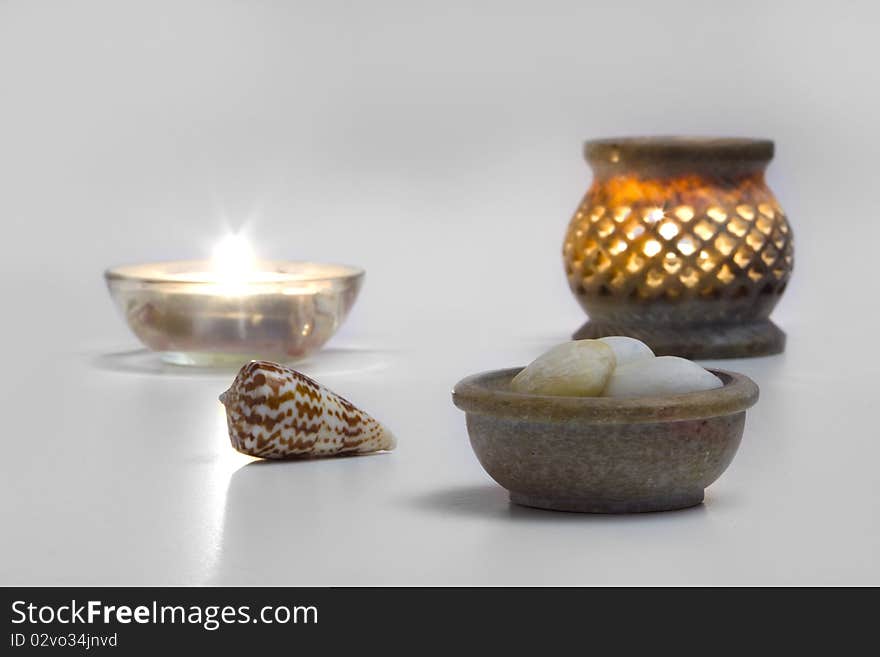 Candles, and stones, concept of,  wellness, zen, health and mental peace. Candles, and stones, concept of,  wellness, zen, health and mental peace