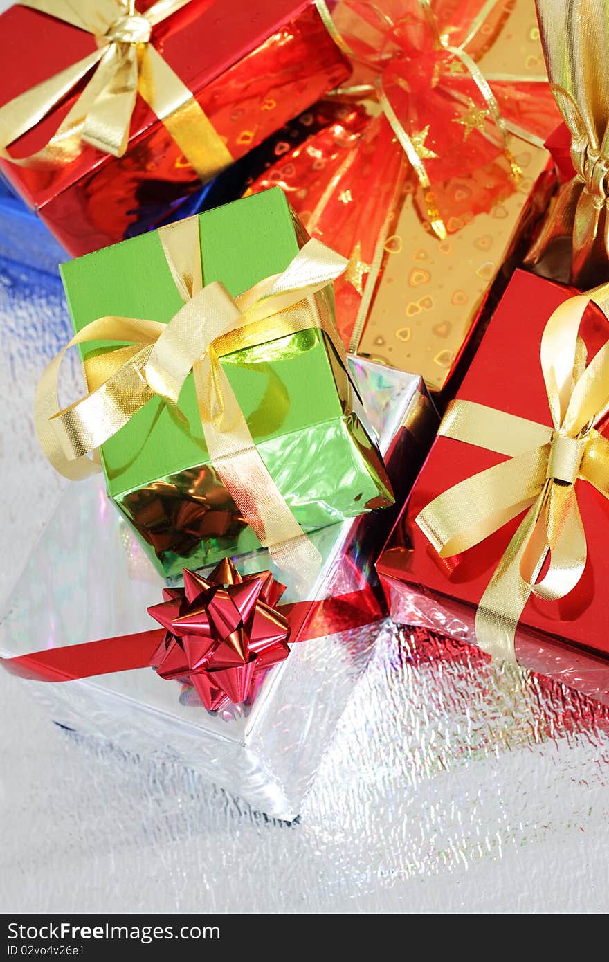 Several multi-colored gift boxes