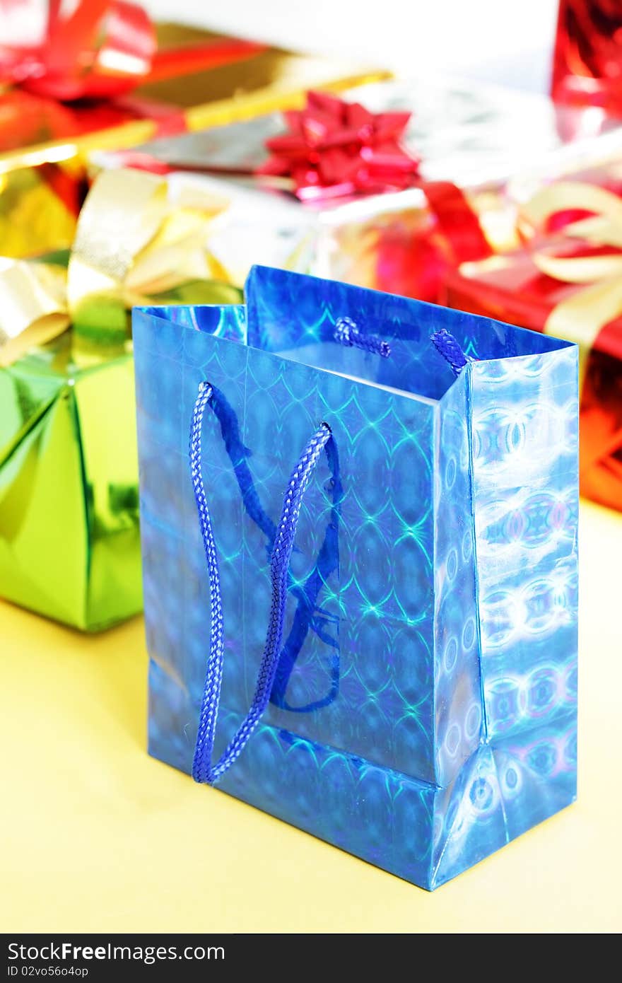 Several multi-colored gift boxes