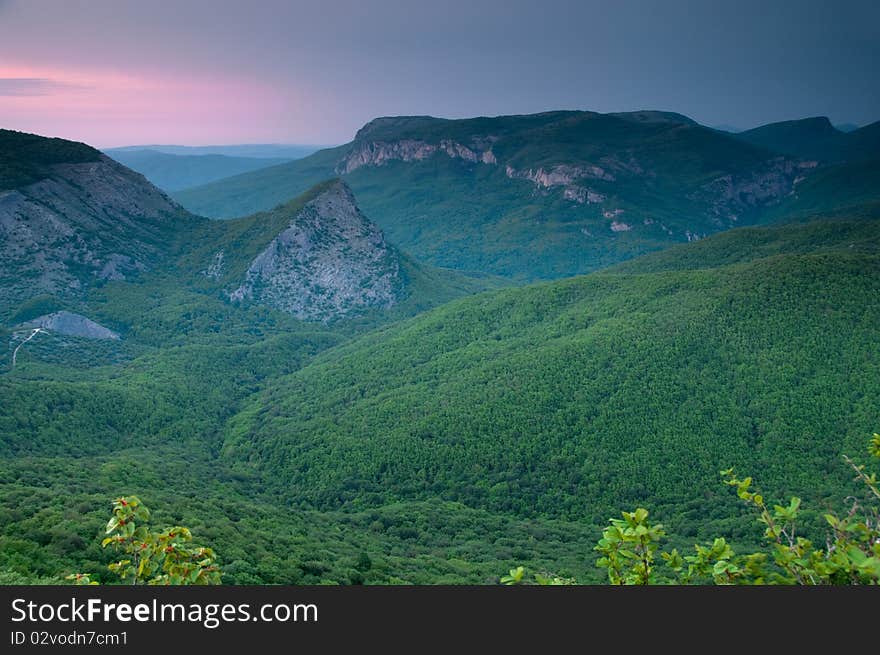 Pink sunset in high mountains