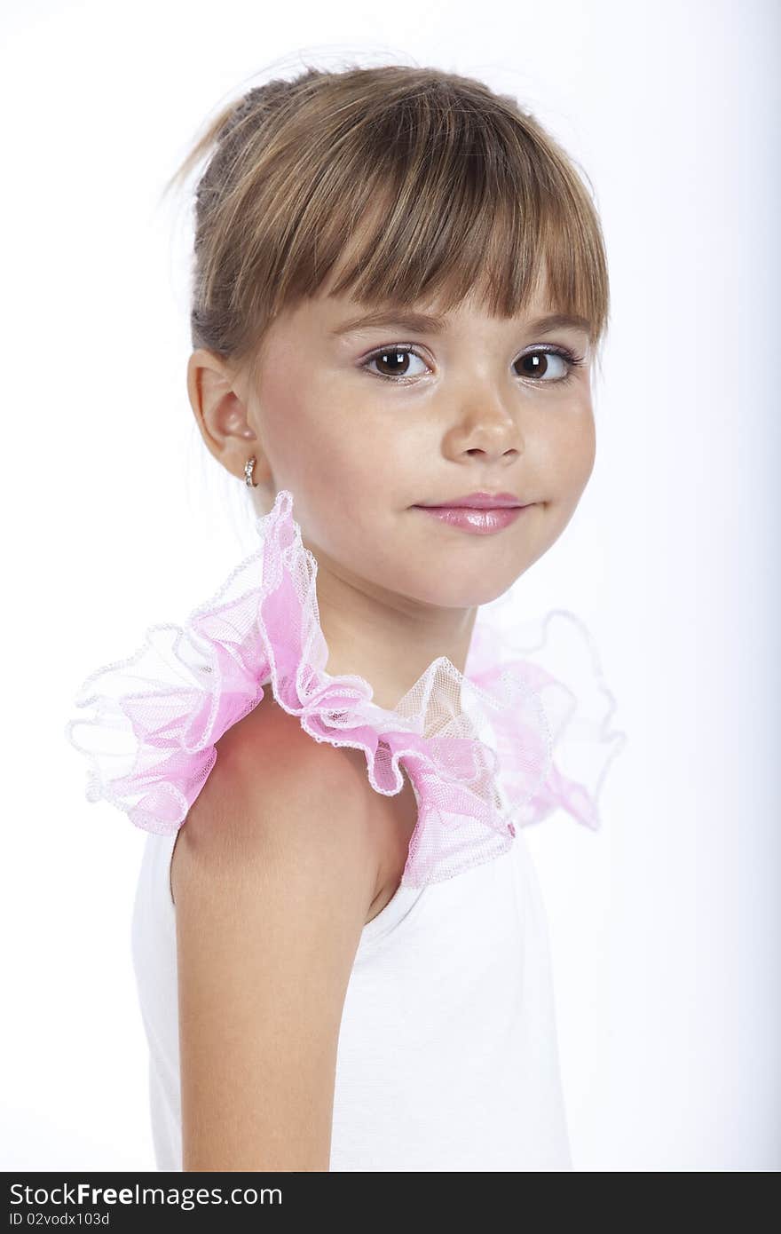 Closeup portrait of a cute little girl, 5 years old,smiling and posing, studio image. Closeup portrait of a cute little girl, 5 years old,smiling and posing, studio image