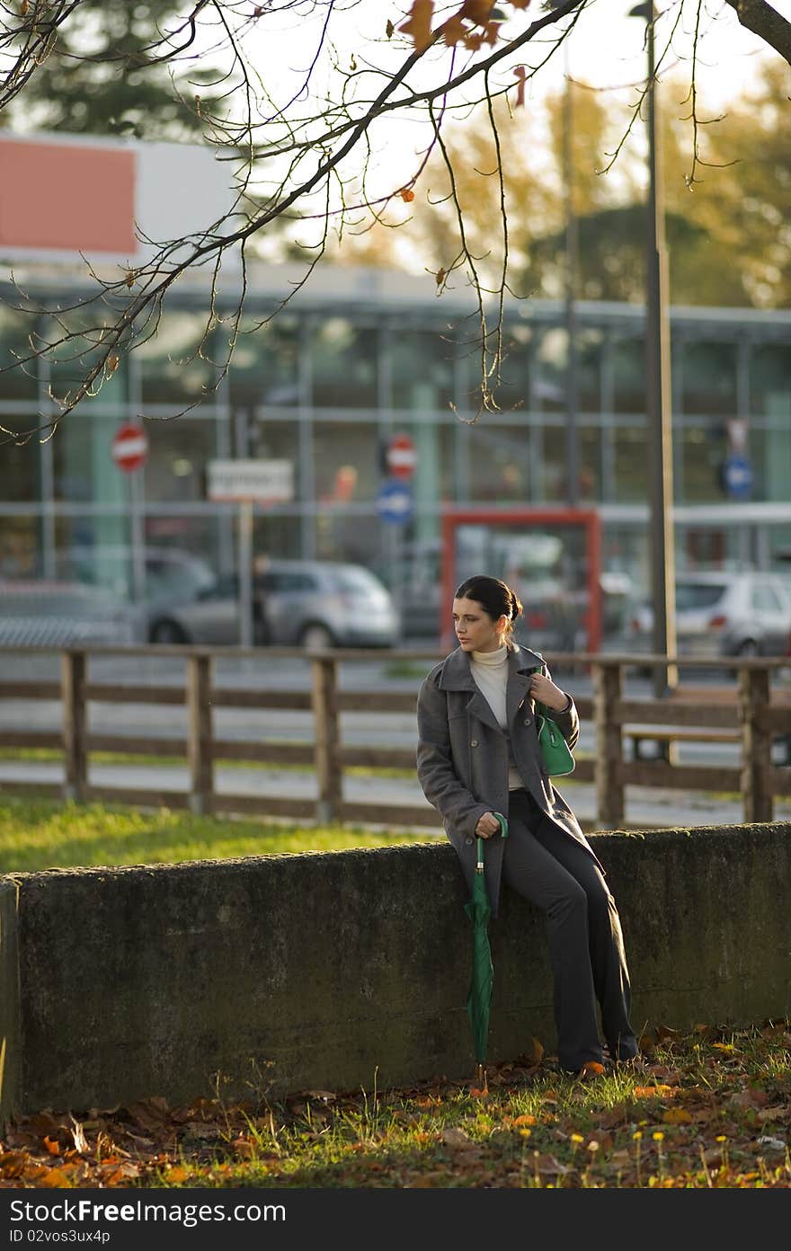 Young busineswoman resting outside