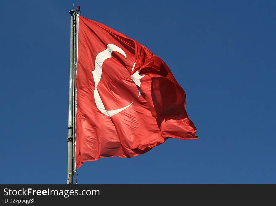 Turkish flag waving in a wind. Turkish flag waving in a wind.