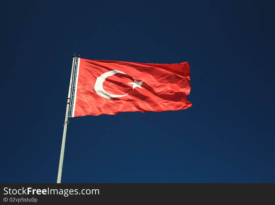 Turkish flag waving in a wind. Turkish flag waving in a wind.