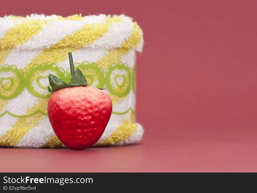 Fake Strawberry with Face Towel Roll. Fake Strawberry with Face Towel Roll