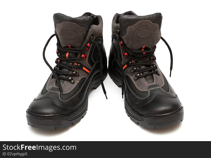 Leather boot on a thick sole on a white background