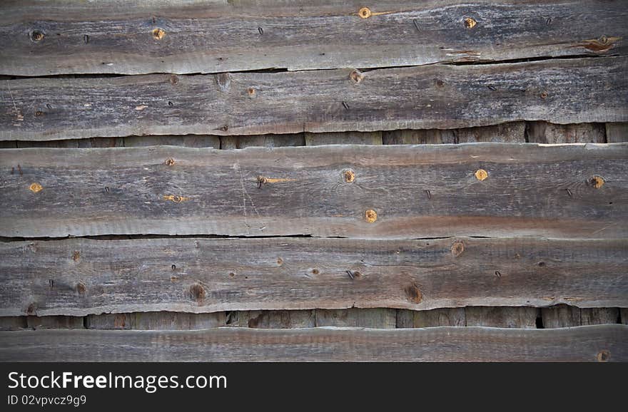 Background in a grunge style in the form of old wooden boards