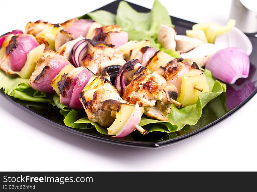 Cooked chicken and vegetables skewers. Cooked chicken and vegetables skewers