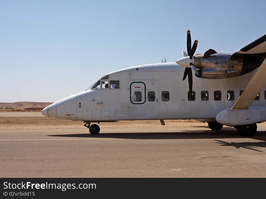 Small airplane on the runway ready to take off