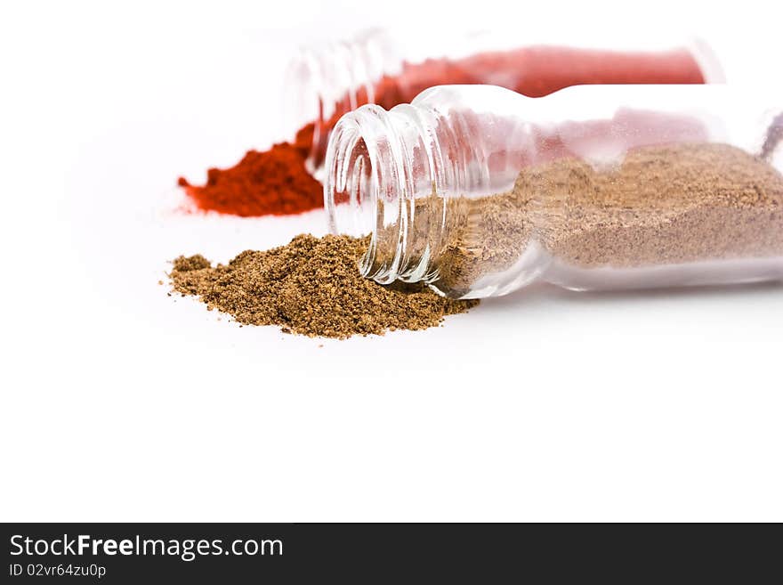 Close up shot of scattered paprika isolated on white