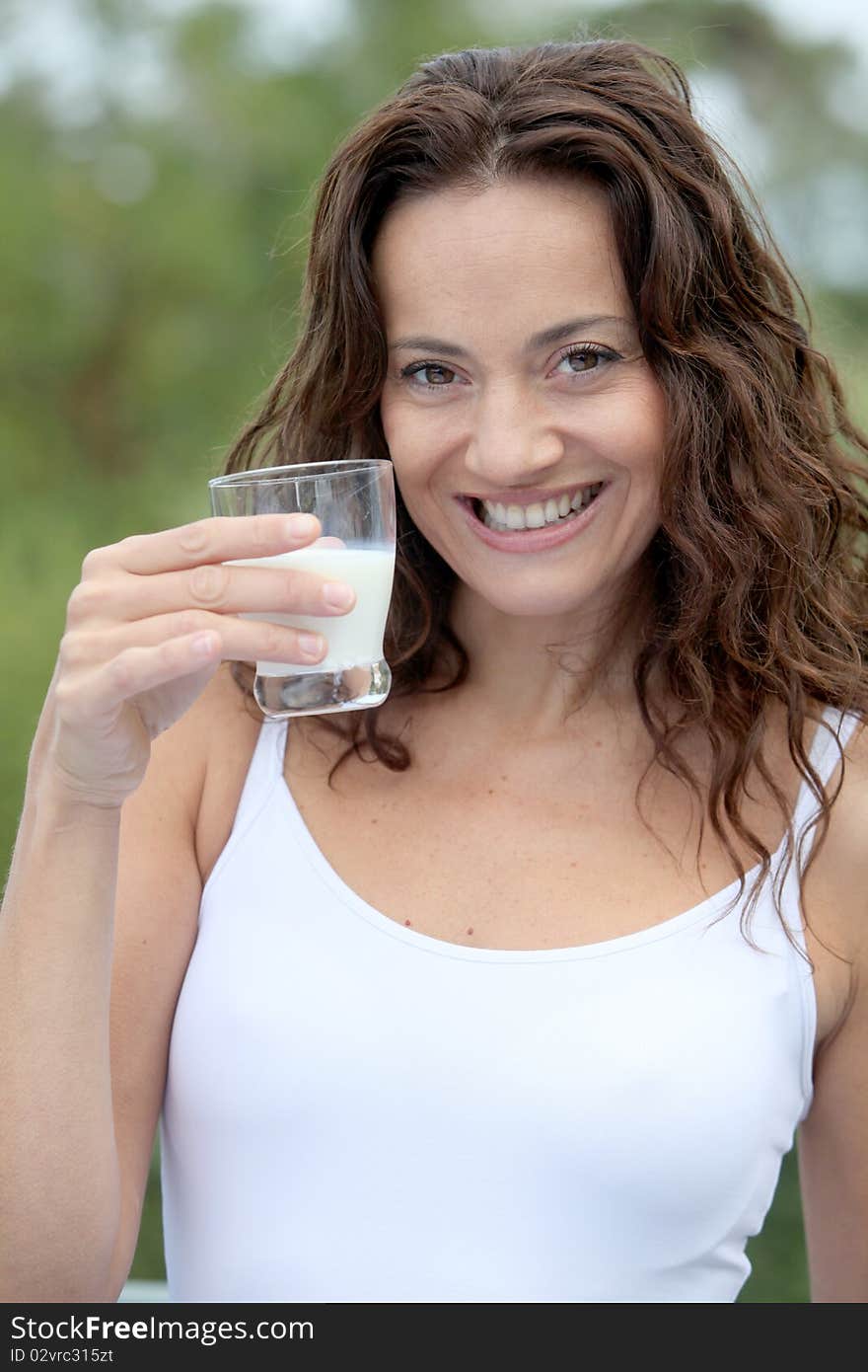 Woman Holding Glass Of Milk